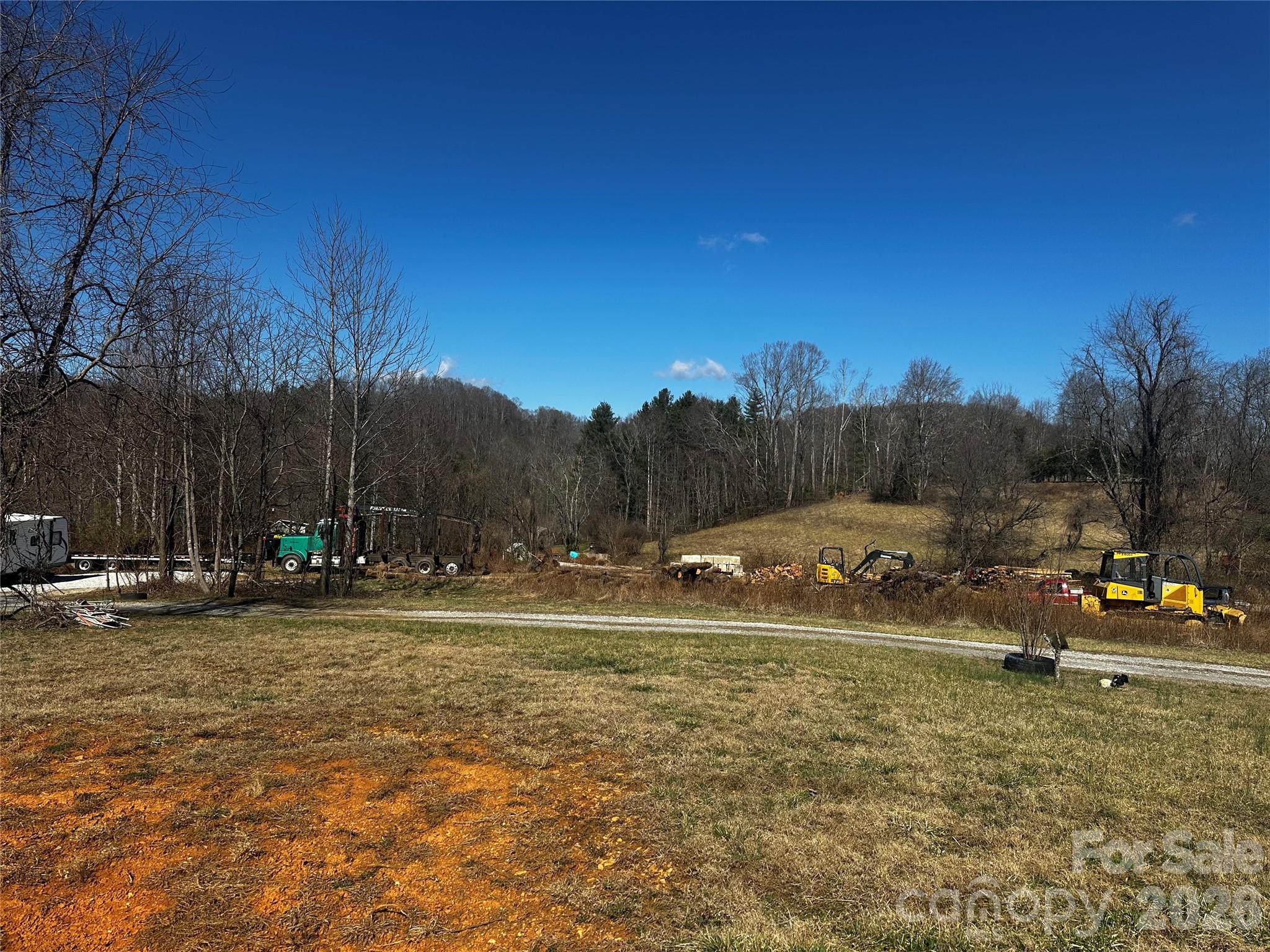 400 Old Dale Road Spruce Pine, NC 28777 - Photo 7 of 24 a view of swimming pool and trees in the background