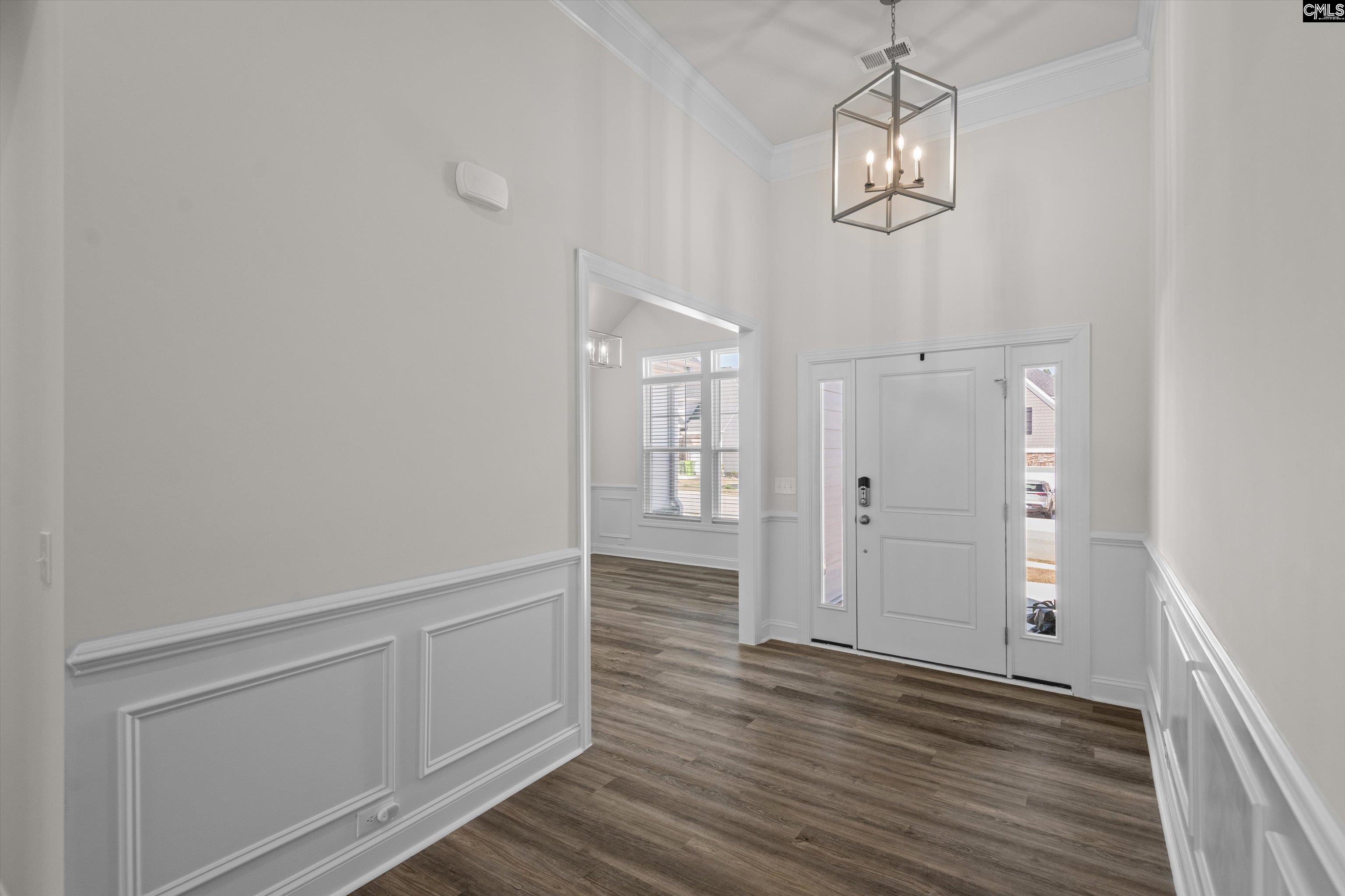 558 Wild Ginger Loop Irmo, SC 29063 - Photo 3 of 42 a view of empty room with wooden floor