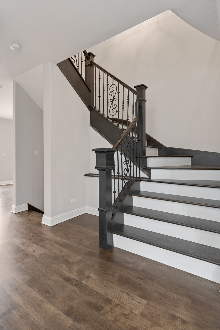 115 Washington Street Glenview, IL 60025 - Photo 16 of 40 a view of entryway and hall with wooden floor