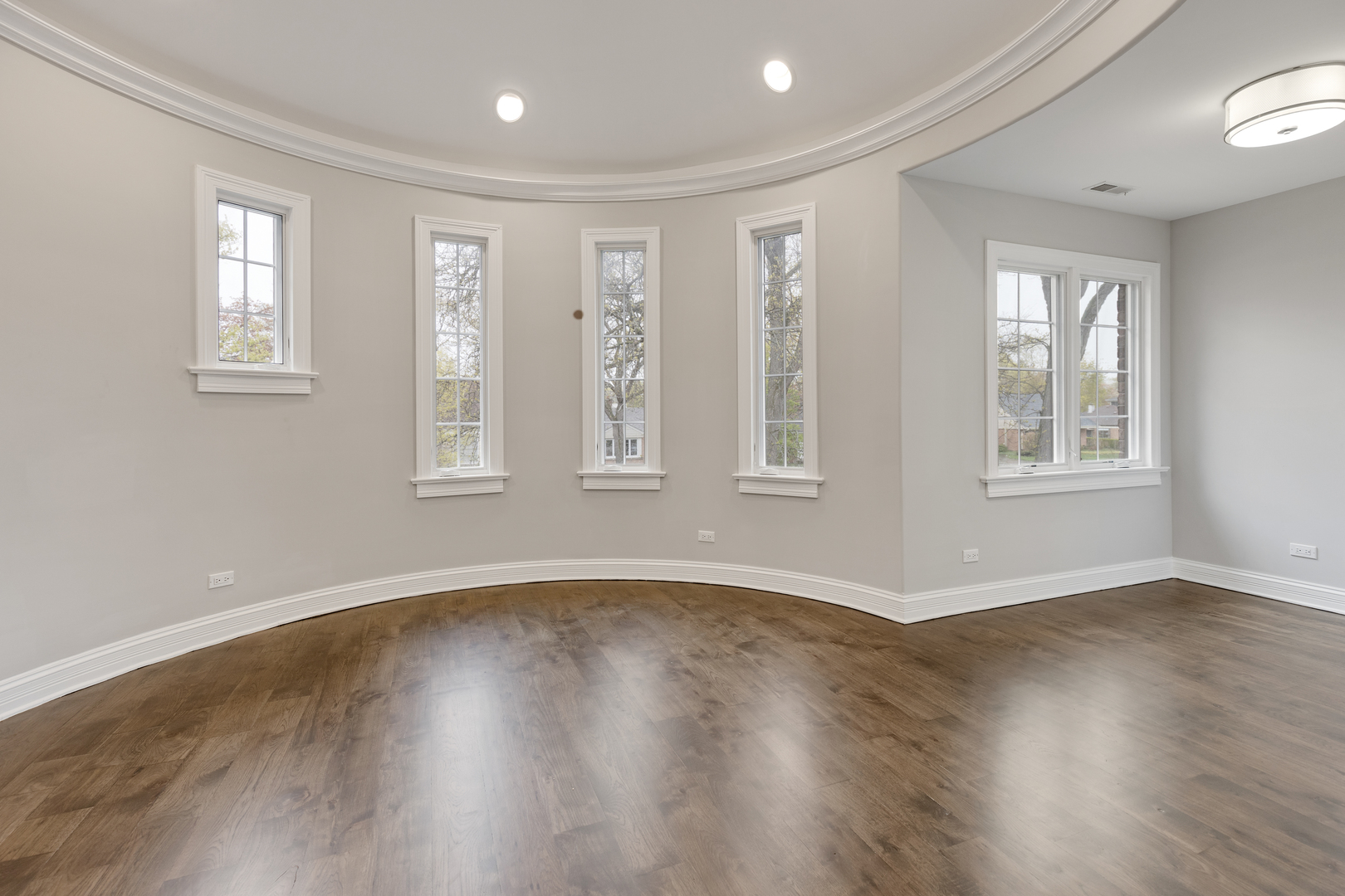 115 Washington Street Glenview, IL 60025 - Photo 23 of 40 a view of an empty room with wooden floor and window