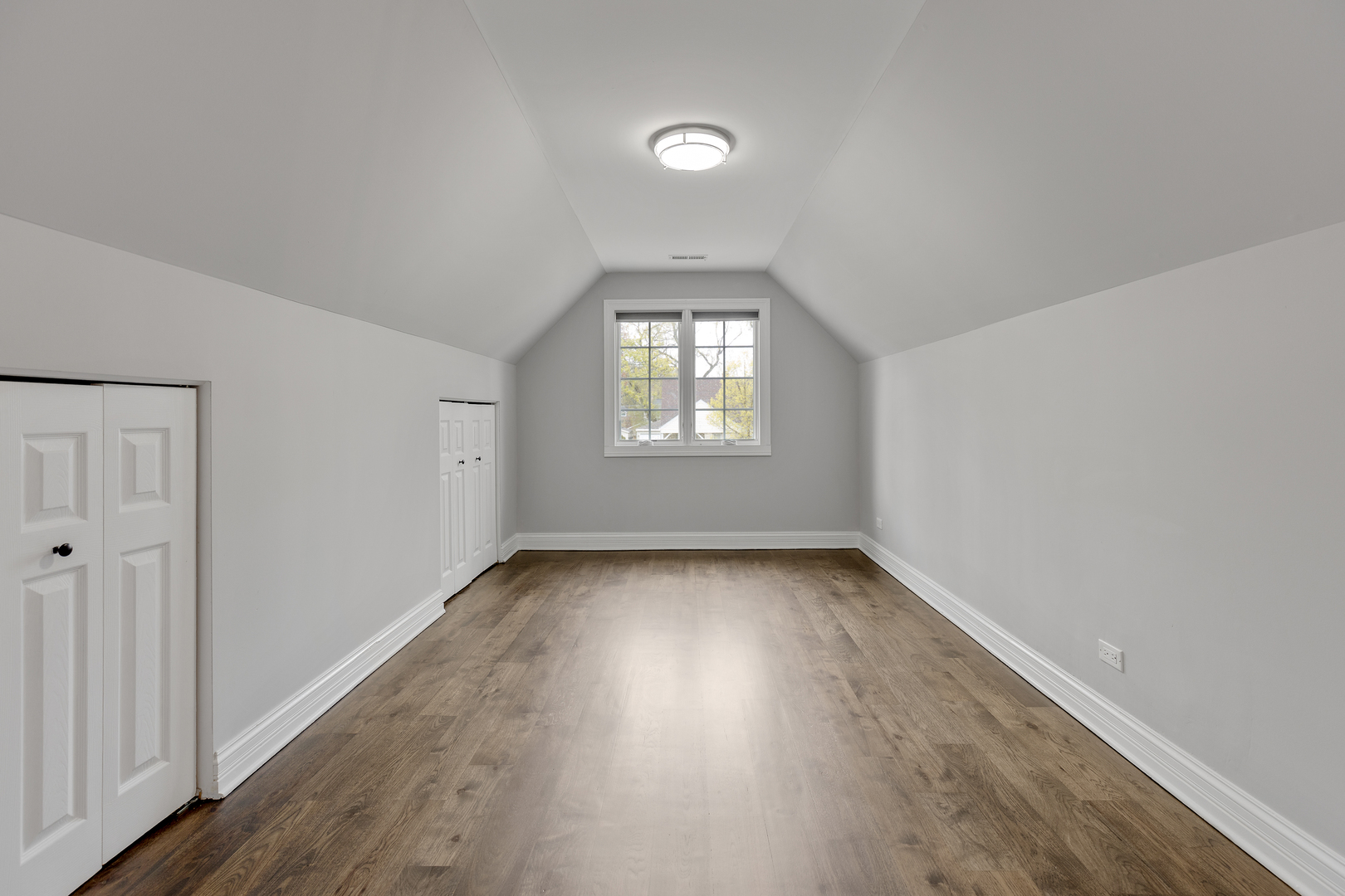 115 Washington Street Glenview, IL 60025 - Photo 28 of 40 an empty room with wooden floor and windows