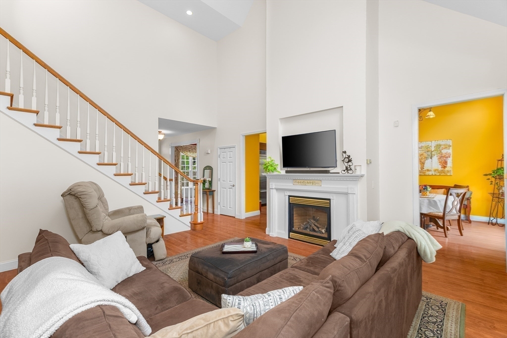 113 Greenwich Plains Road Ware, MA 01082 - Photo 11 of 42 a living room with furniture fireplace and flat screen tv
