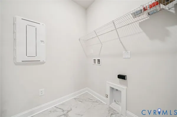 an empty room with white walls