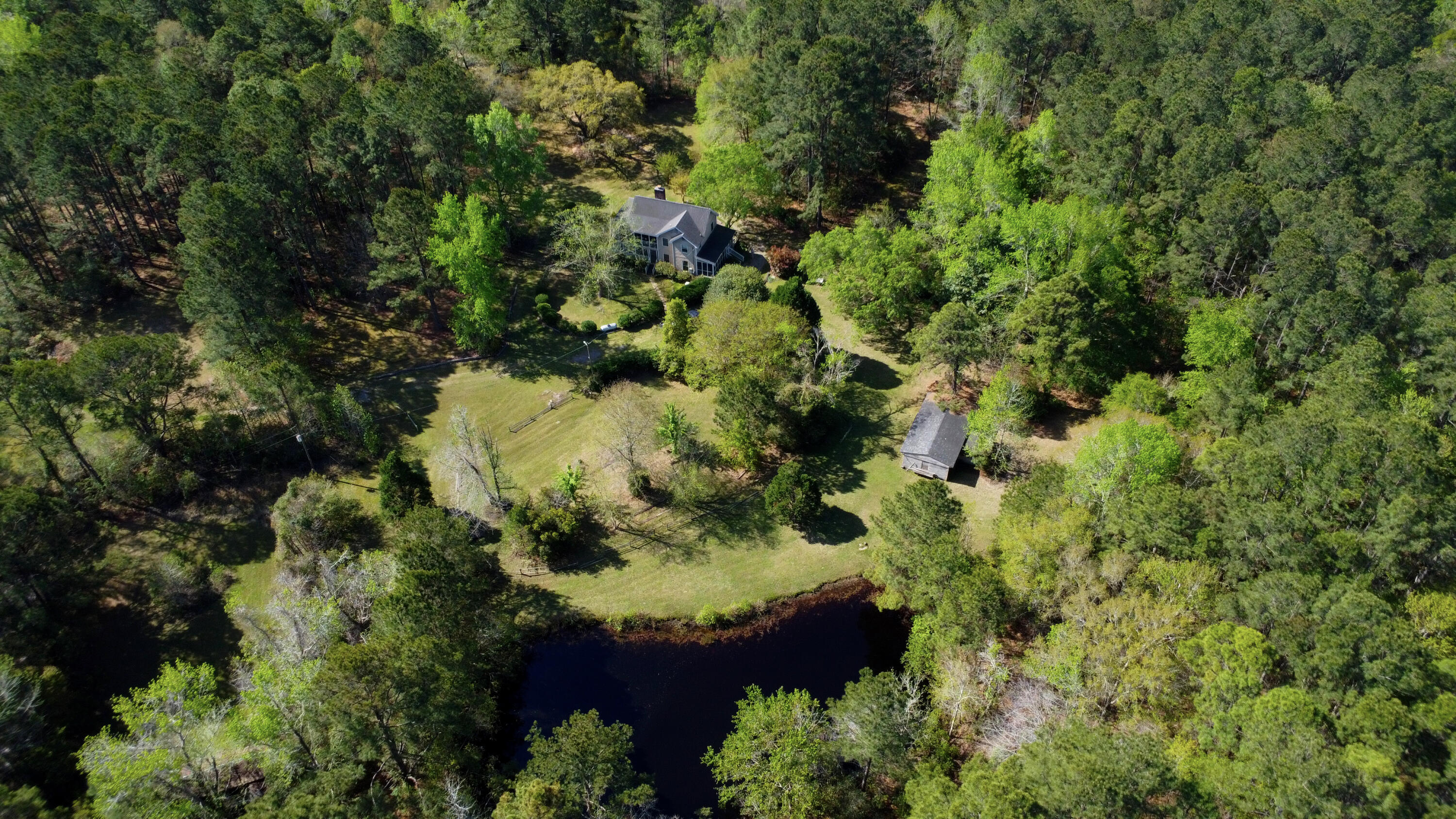 1183 White Road Awendaw, SC 29429 - Photo 5 of 43 2-Aerial house with pond