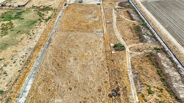 a view of swimming pool with outdoor seating