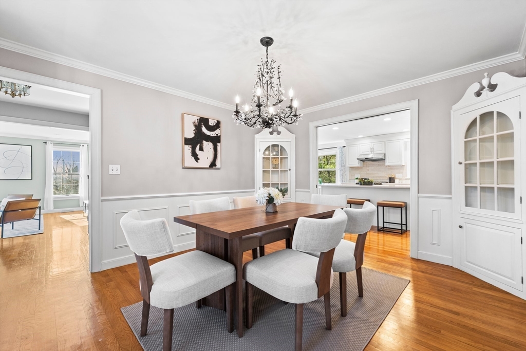 24 Battle Green Road Lexington, MA 02421 - Photo 6 of 25 a view of a dining room with furniture wooden floor and chandelier
