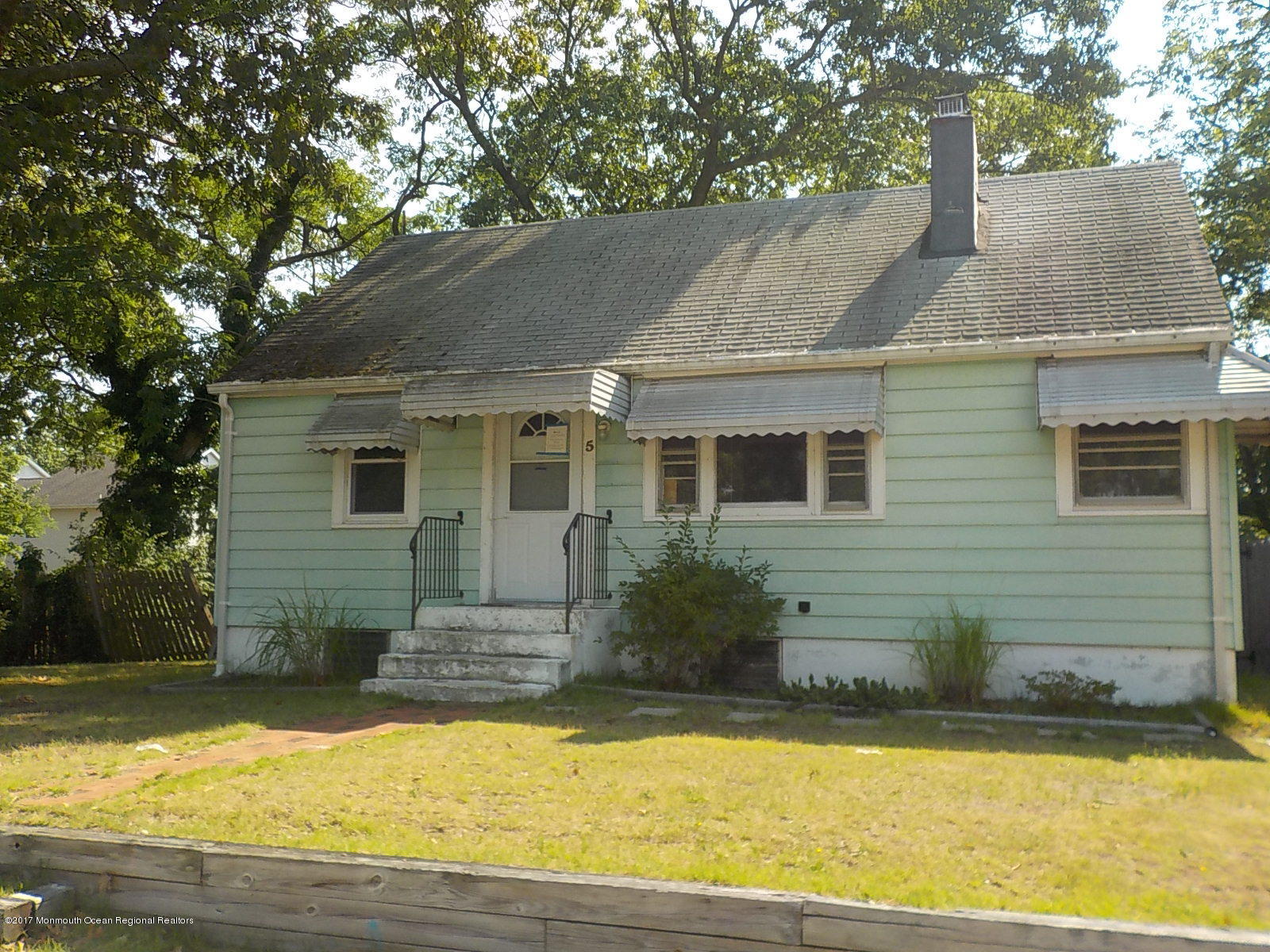 5 Stuyvesant Road Brick, NJ 08723 - Photo 1 of 10 a front view of a house with a yard