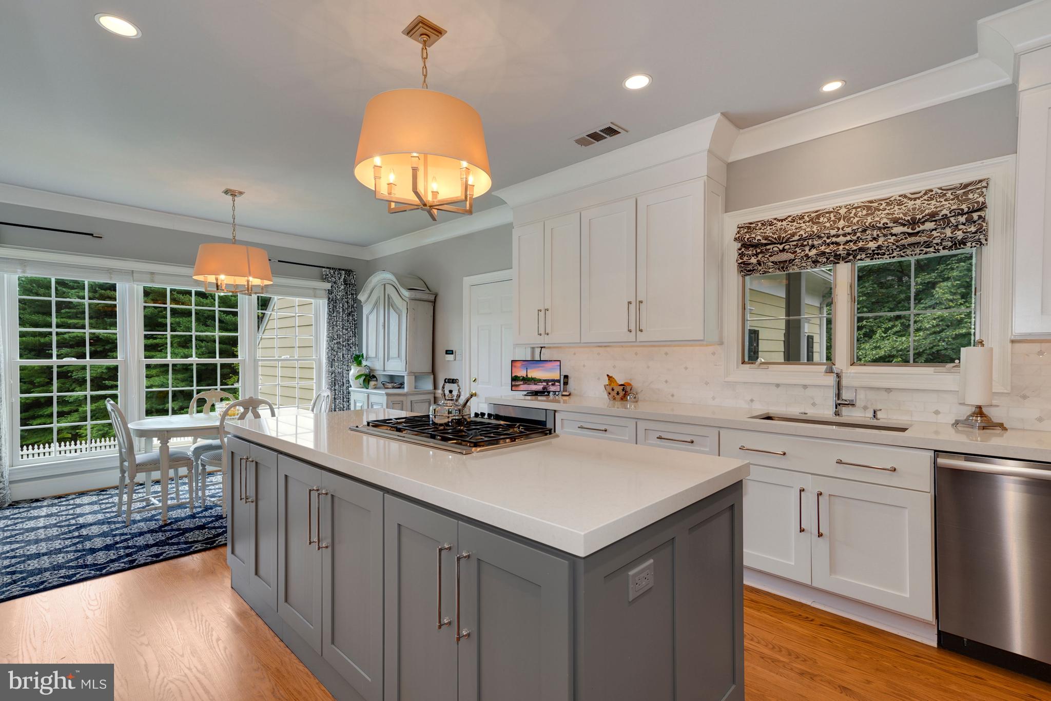 11512 Glen Road Potomac, MD 20854 - Photo 12 of 47 Extended island and cooktop on the island