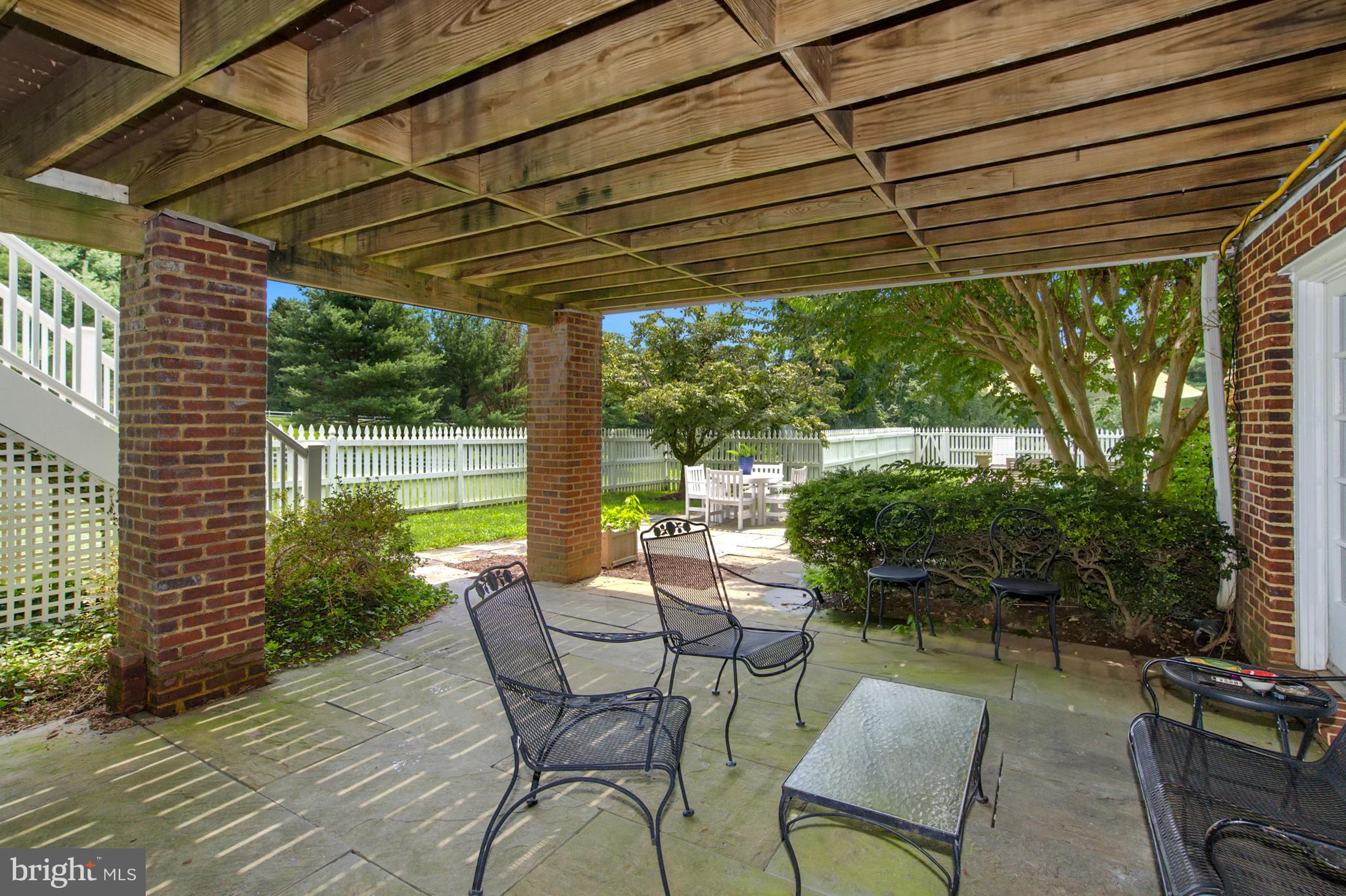 11512 Glen Road Potomac, MD 20854 - Photo 35 of 47 Patio adjacent to the Rec room, to the Pool patio
