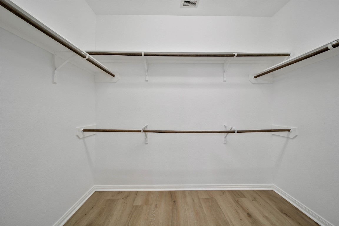 4419 Fenway Park Way Spring, TX 77389 - Photo 18 of 36 a view of an empty walk in closet