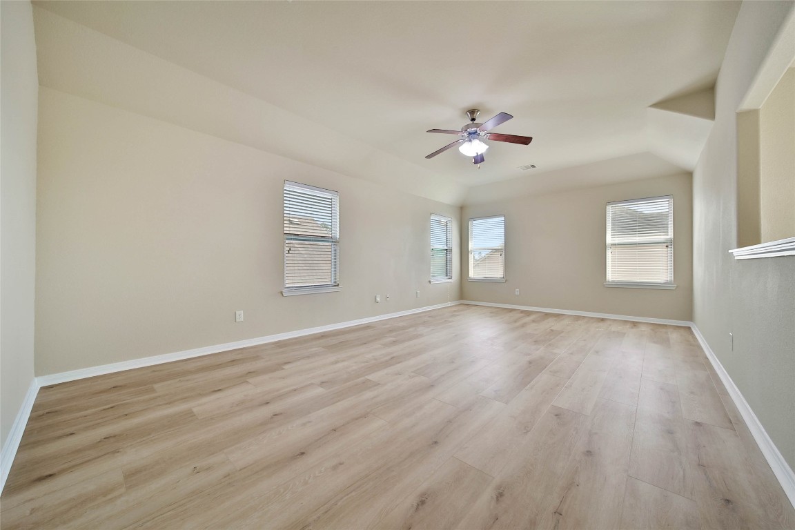 4419 Fenway Park Way Spring, TX 77389 - Photo 21 of 36 wooden floor in an empty room with a window