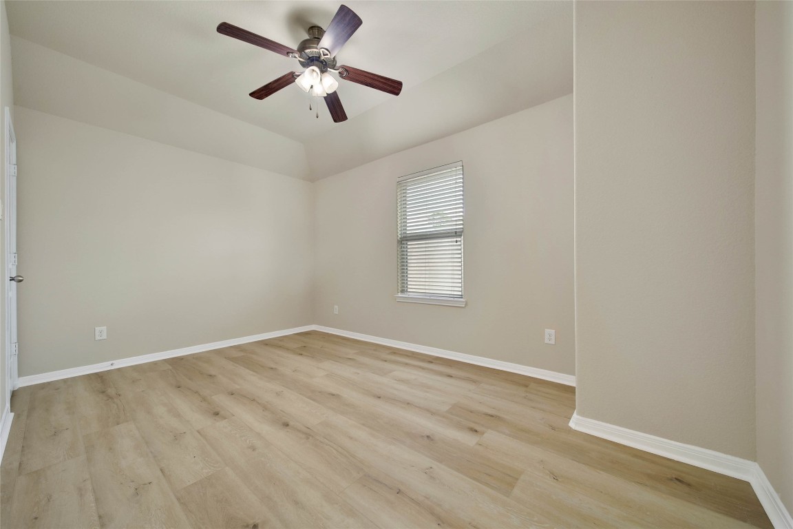 4419 Fenway Park Way Spring, TX 77389 - Photo 23 of 36 an empty room with a window and a fan