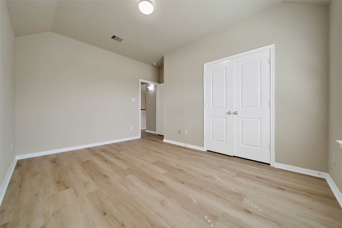 4419 Fenway Park Way Spring, TX 77389 - Photo 29 of 36 a view of an empty room and wooden floor