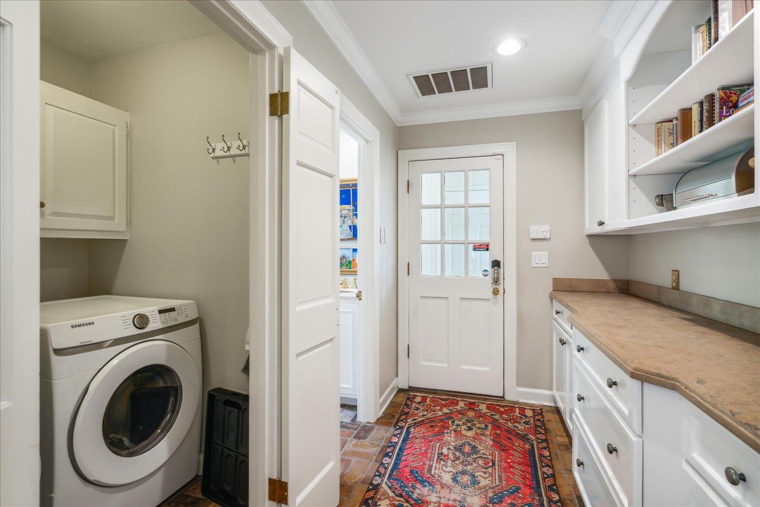 4585 Walnut Grove Road Memphis, TN 38117 - Photo 16 of 36 a view of a kitchen with fridge and wooden floor