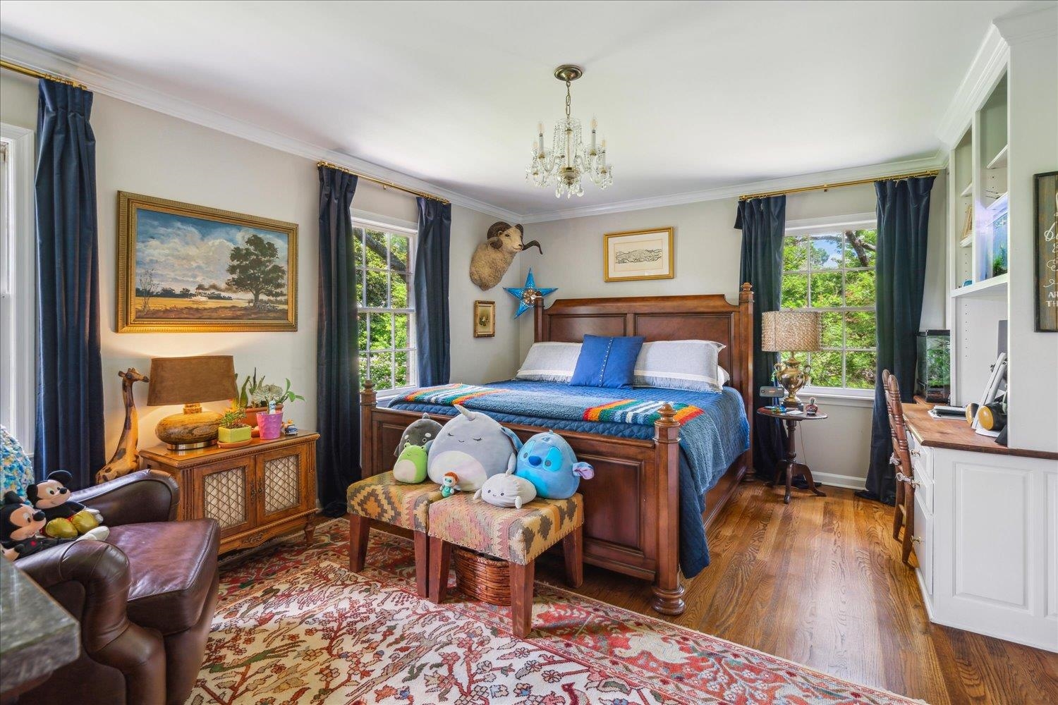 4585 Walnut Grove Road Memphis, TN 38117 - Photo 25 of 36 a bedroom with a bed and wooden floor