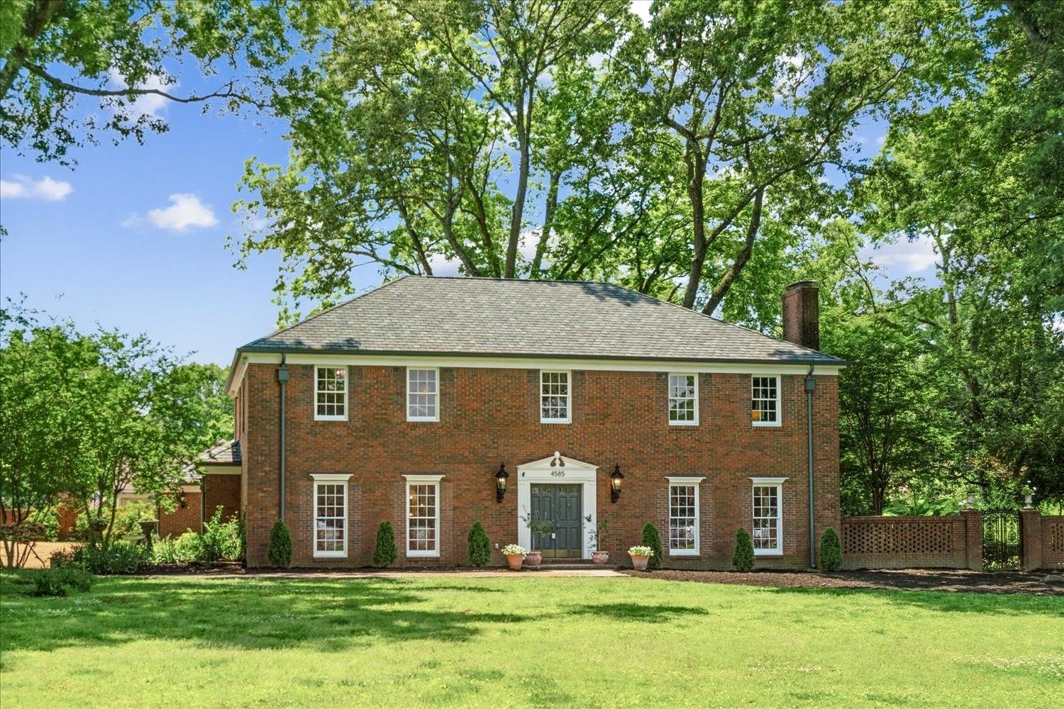4585 Walnut Grove Road Memphis, TN 38117 - Photo 3 of 36 front view of house with a yard