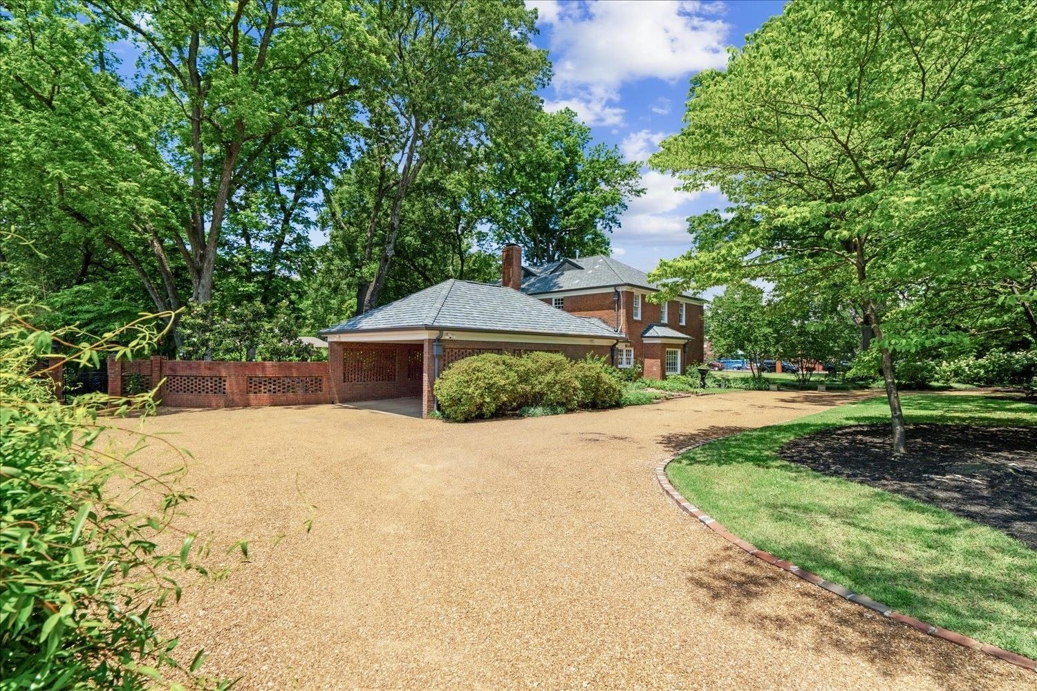4585 Walnut Grove Road Memphis, TN 38117 - Photo 36 of 36 a house view with a garden space