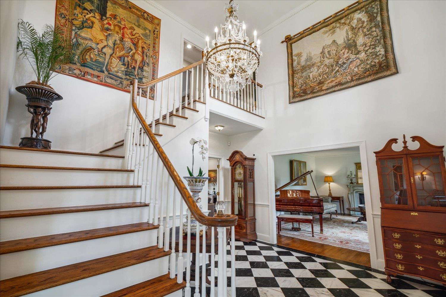 4585 Walnut Grove Road Memphis, TN 38117 - Photo 4 of 36 a view of entryway livingroom and hall with wooden floor