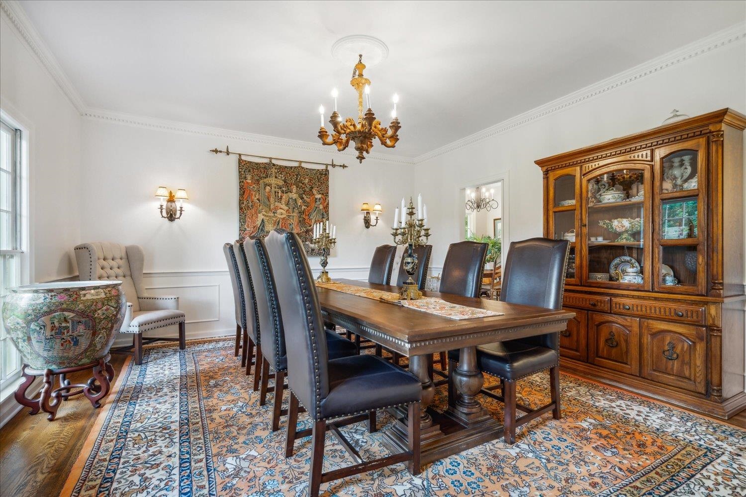 4585 Walnut Grove Road Memphis, TN 38117 - Photo 7 of 36 a view of a dining room with furniture