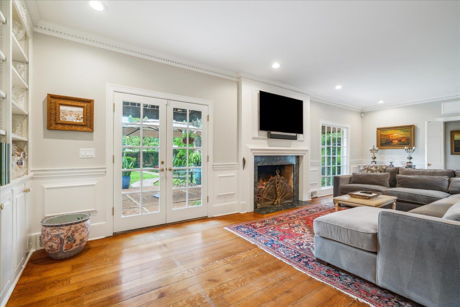 4585 Walnut Grove Road Memphis, TN 38117 - Photo 8 of 36 a living room with furniture fireplace and flat screen tv