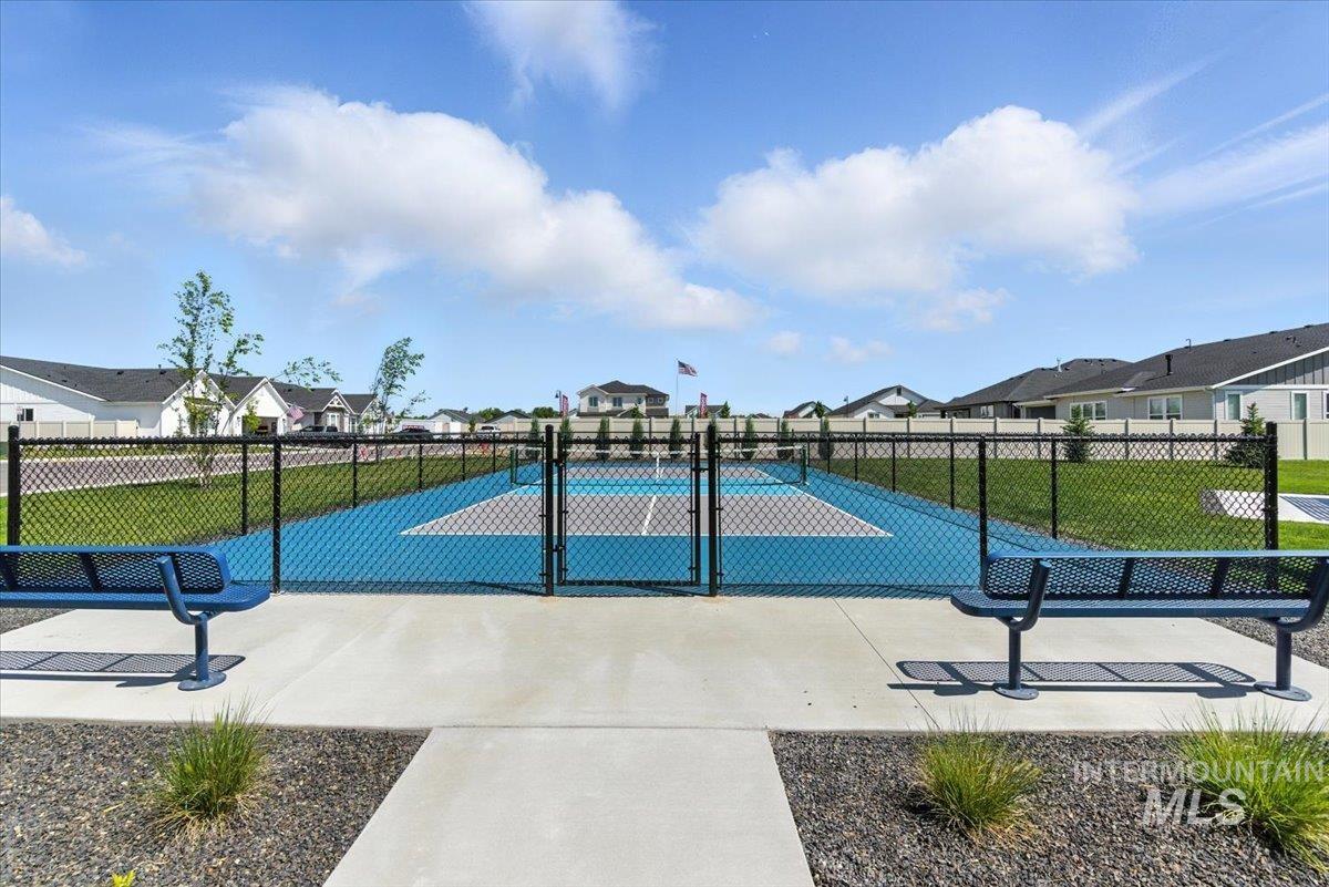 2295 North Ice Fire Avenue Star, ID 83669 - Photo 37 of 39 Surrounding community featuring a tennis court, a residential view, and a gate