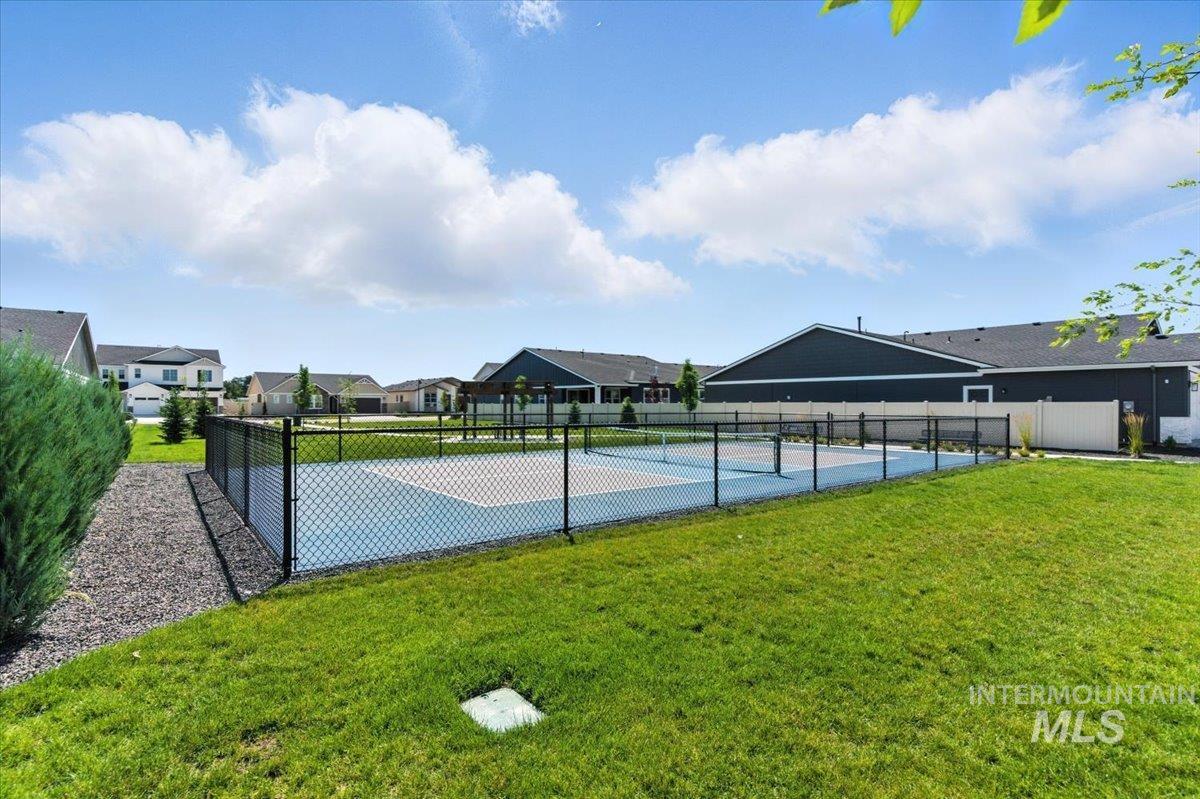 2295 North Ice Fire Avenue Star, ID 83669 - Photo 38 of 39 View of sport court with a tennis court and a residential view