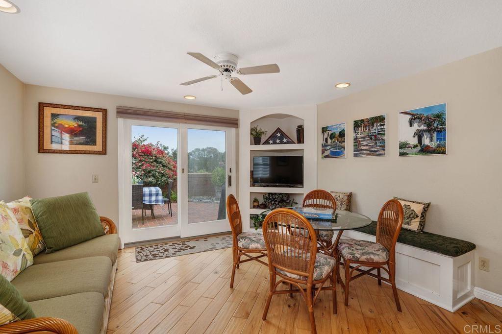 7010 Lantana Terrace Carlsbad, CA 92011 - Photo 10 of 45 a living room with furniture and a flat screen tv