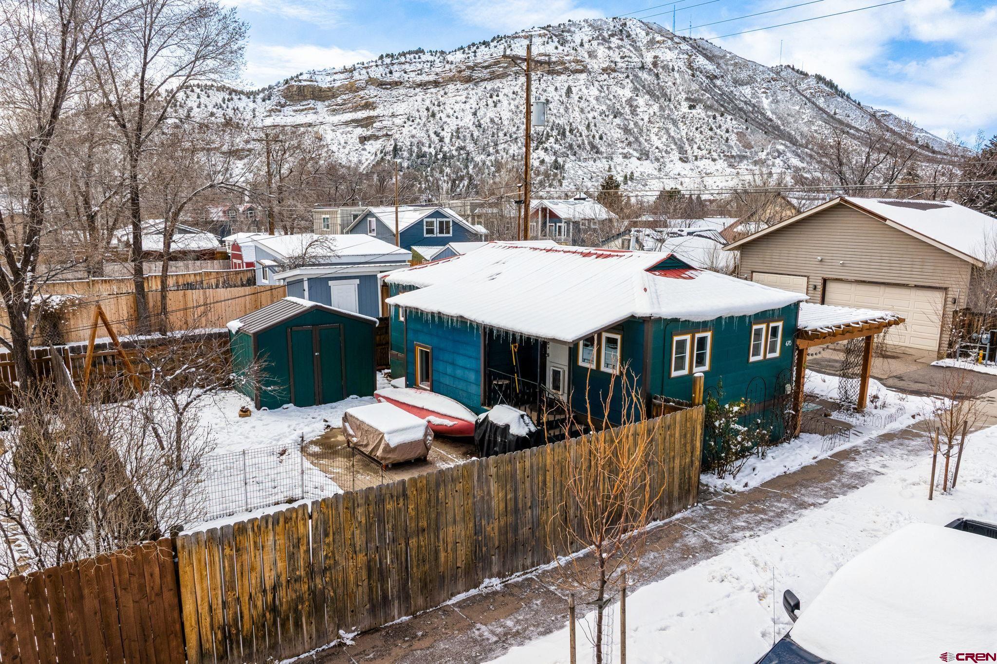 476 East 5th Street Durango, CO 81301 - Photo 27 of 40 a view of a patio with table and chairs near a yard