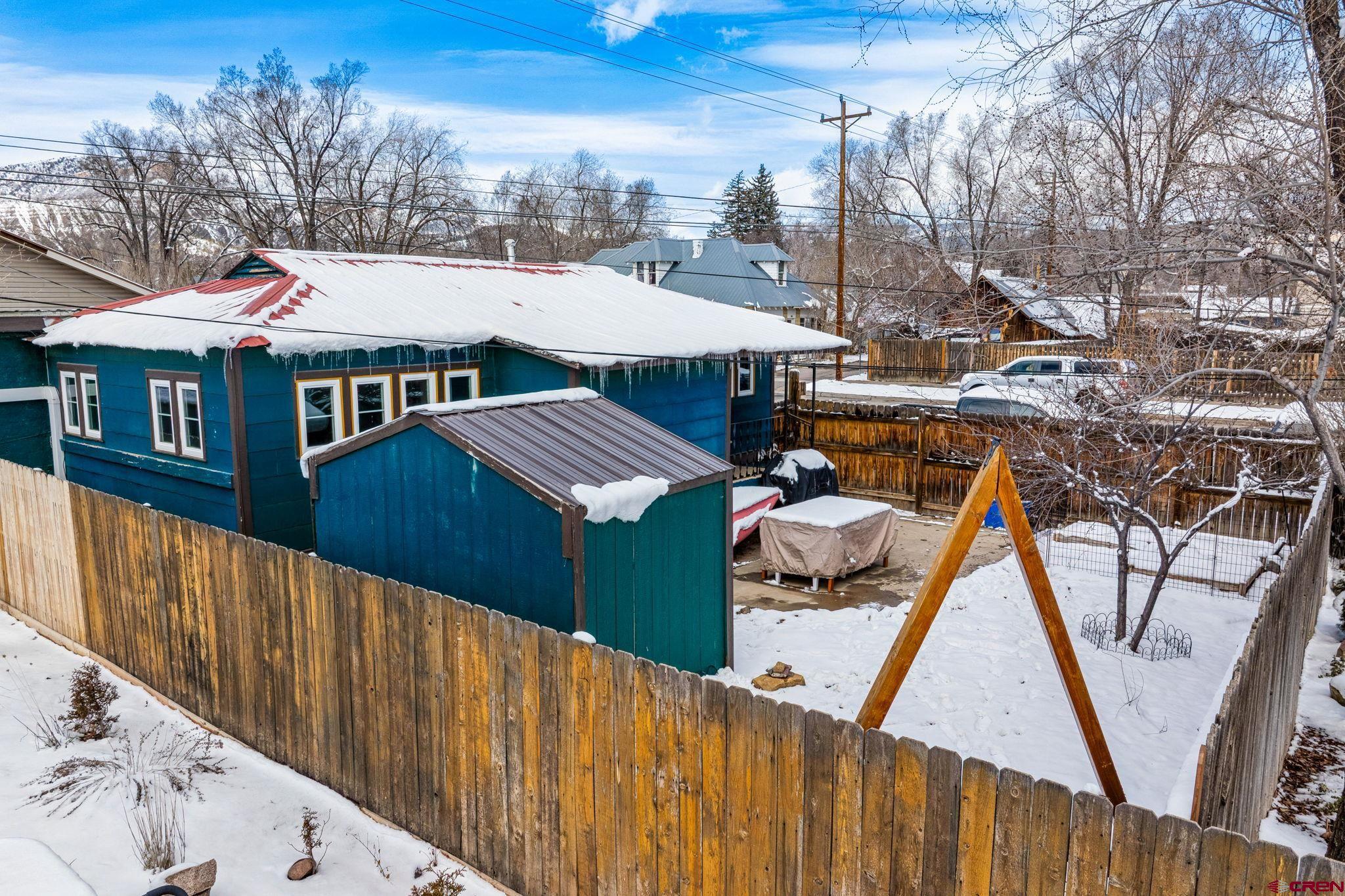 476 East 5th Street Durango, CO 81301 - Photo 28 of 40 a view of house along with deck and outdoor seating
