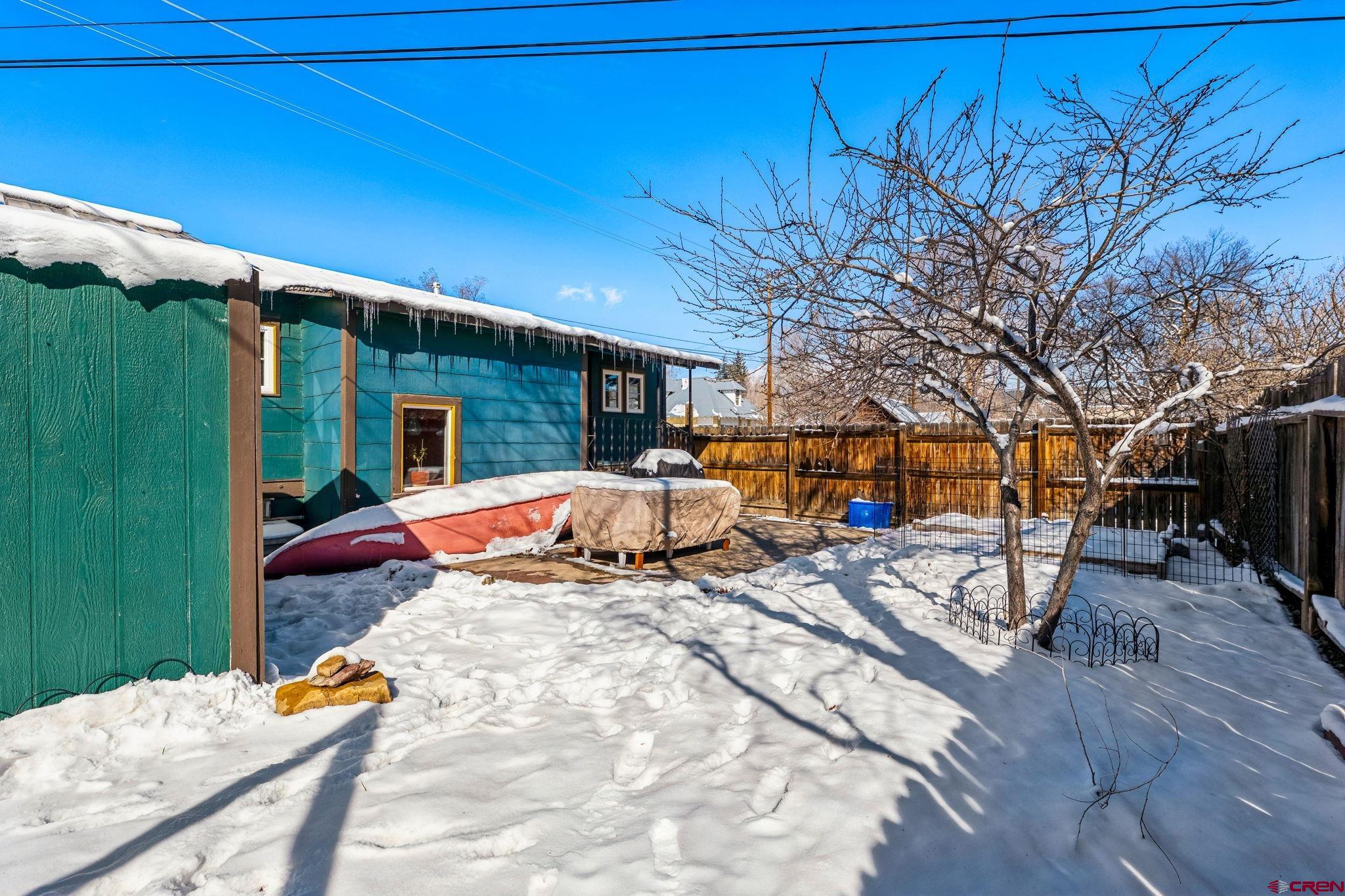 476 East 5th Street Durango, CO 81301 - Photo 32 of 40 a backyard of a house with seating space