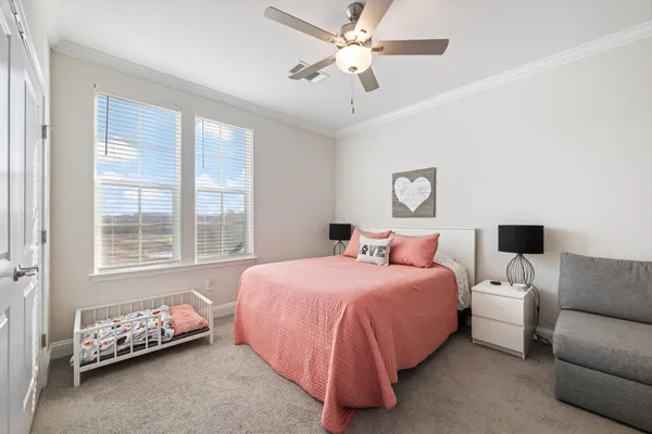 a bathroom with a shower sink and mirror