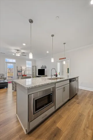 a bedroom with a bed and a couch