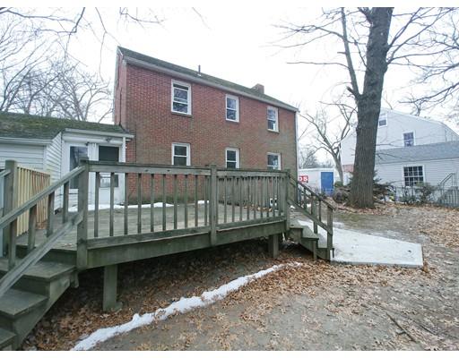 603 Allen Street Springfield, MA 01118 - Photo 3 of 12 a view of a house with a wooden deck