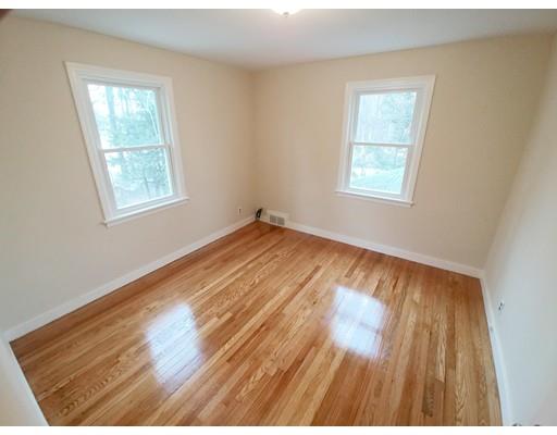 603 Allen Street Springfield, MA 01118 - Photo 9 of 12 a view of an empty room and window