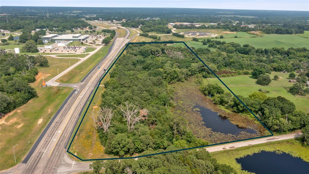 640 Northeast Loop 7 Athens, TX 75751 - Photo 3 of 6 a view of a lake with a outdoor seating