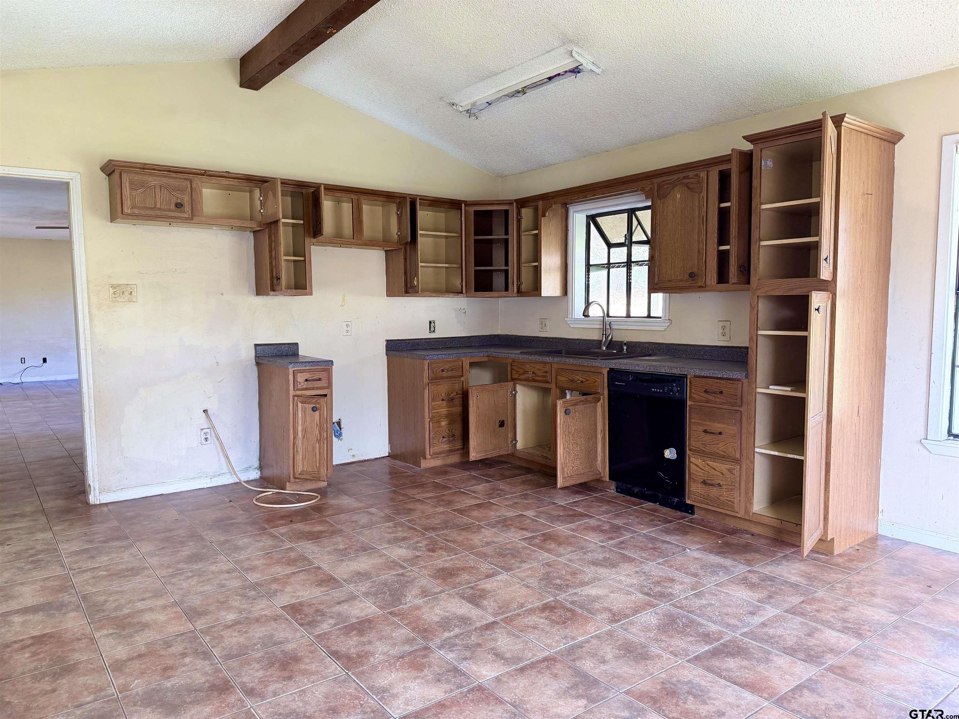 14946 County Road 220 Tyler, TX 75707 - Photo 23 of 41 a view of kitchen with stainless steel appliances granite countertop cabinets and window