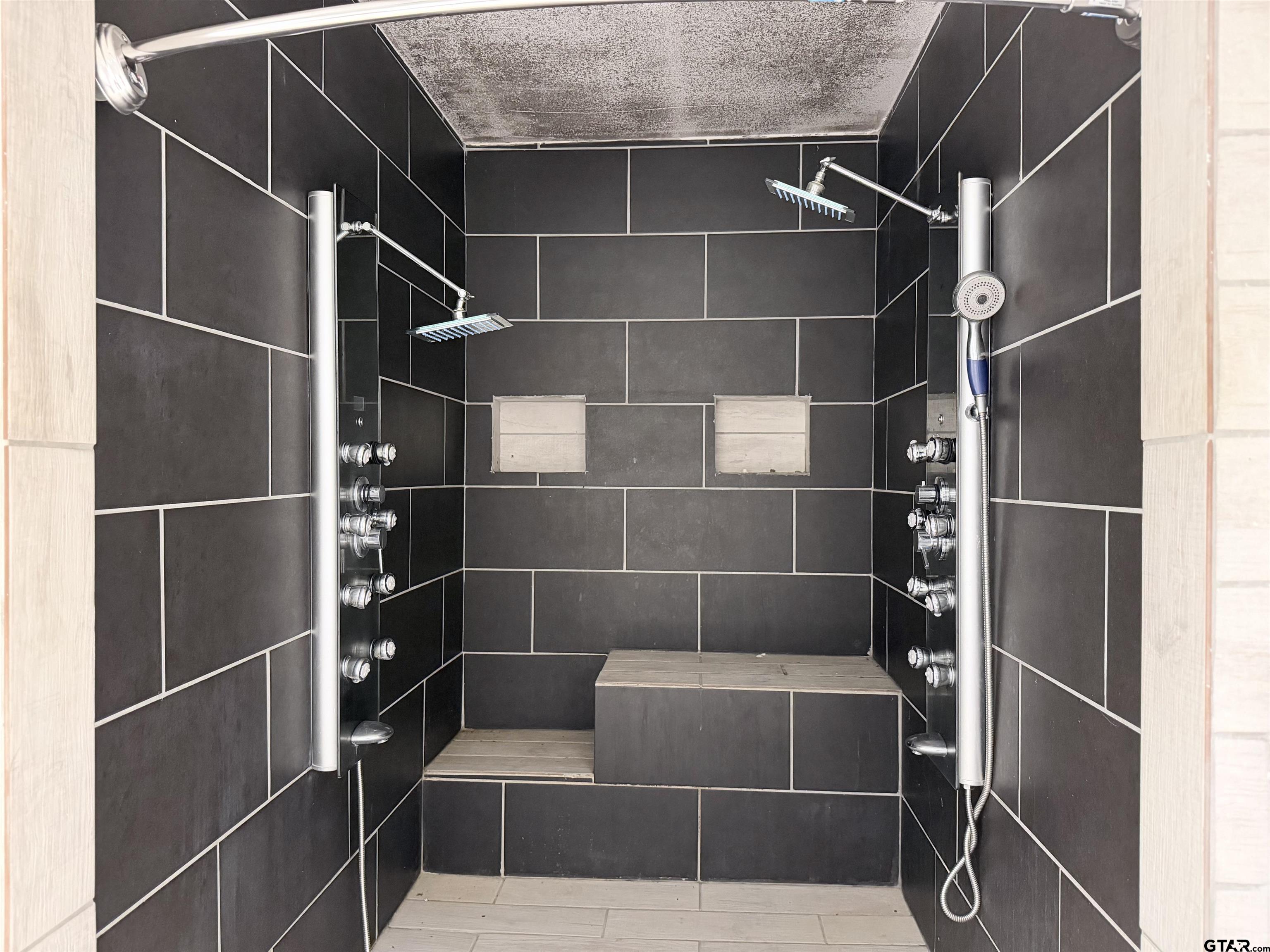 14946 County Road 220 Tyler, TX 75707 - Photo 25 of 41 a bathroom with a shower and a sink