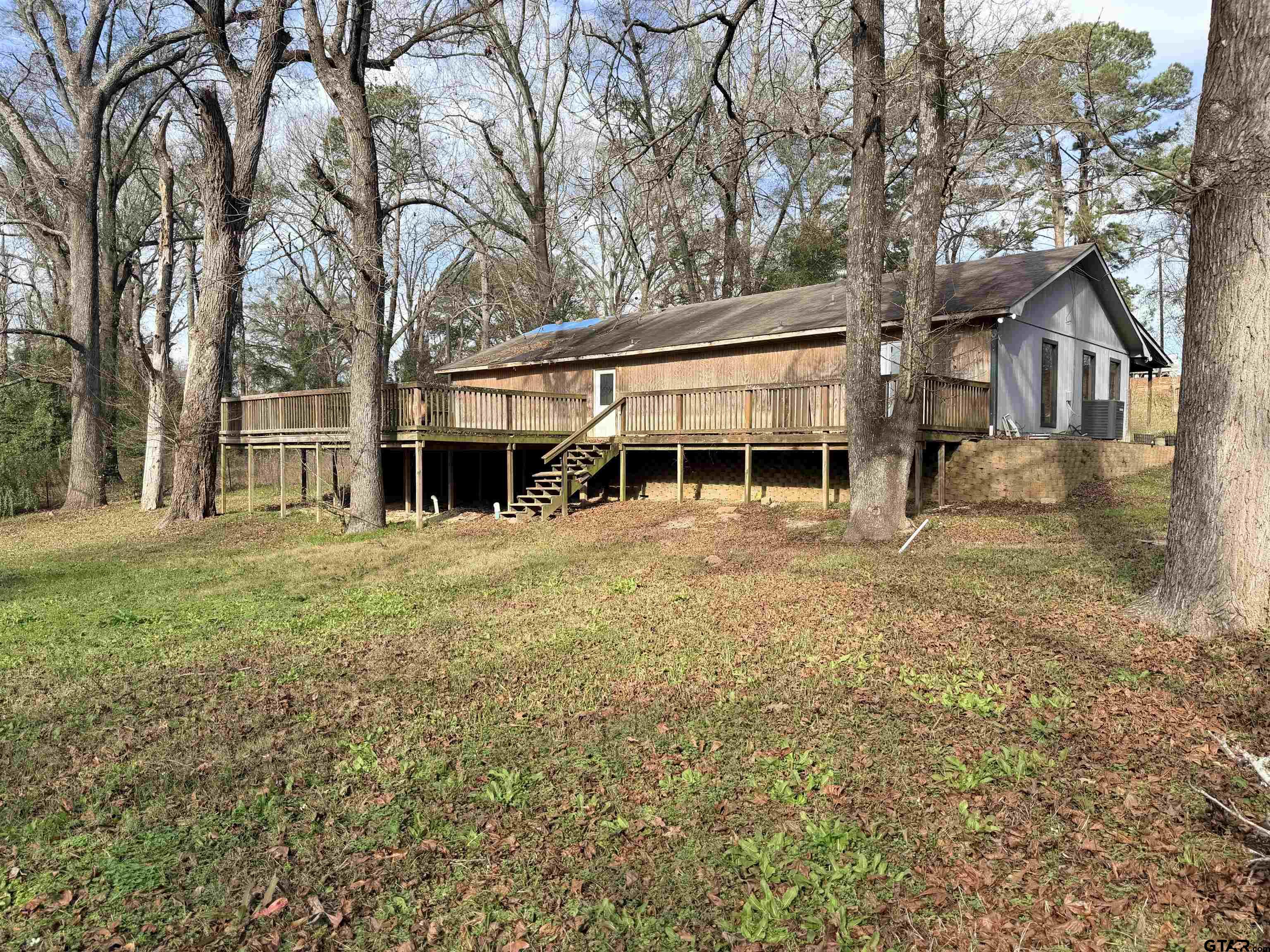 14946 County Road 220 Tyler, TX 75707 - Photo 31 of 41 a view of a house with a yard