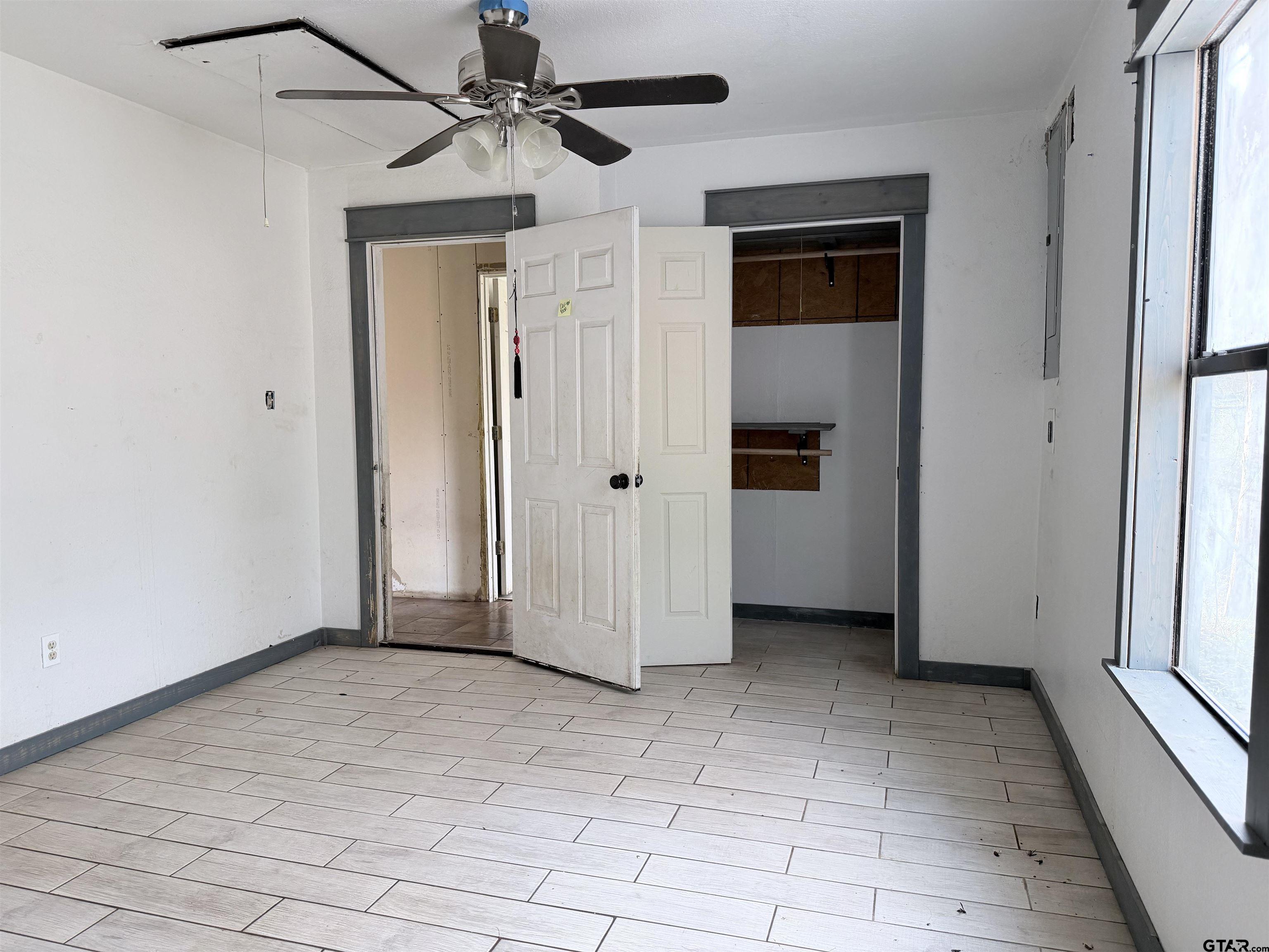 14946 County Road 220 Tyler, TX 75707 - Photo 7 of 41 a view of a livingroom with a chandelier
