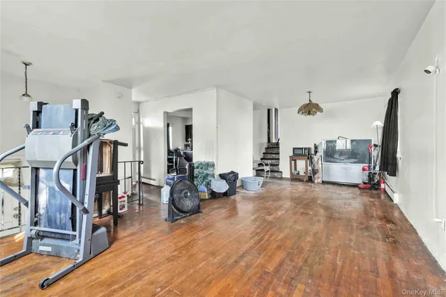 a view of a living room and dining room