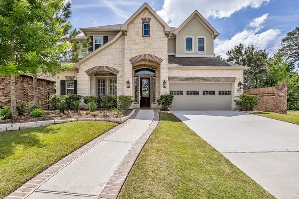 a front view of a house with swimming pool