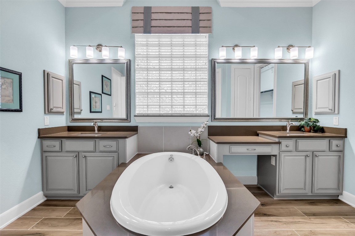 4060 Windsor Chase Drive Spring, TX 77386 - Photo 23 of 40 a bathroom with a sink a mirror and a toilet