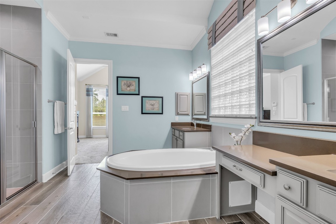 4060 Windsor Chase Drive Spring, TX 77386 - Photo 24 of 40 a kitchen with a sink and wooden floor