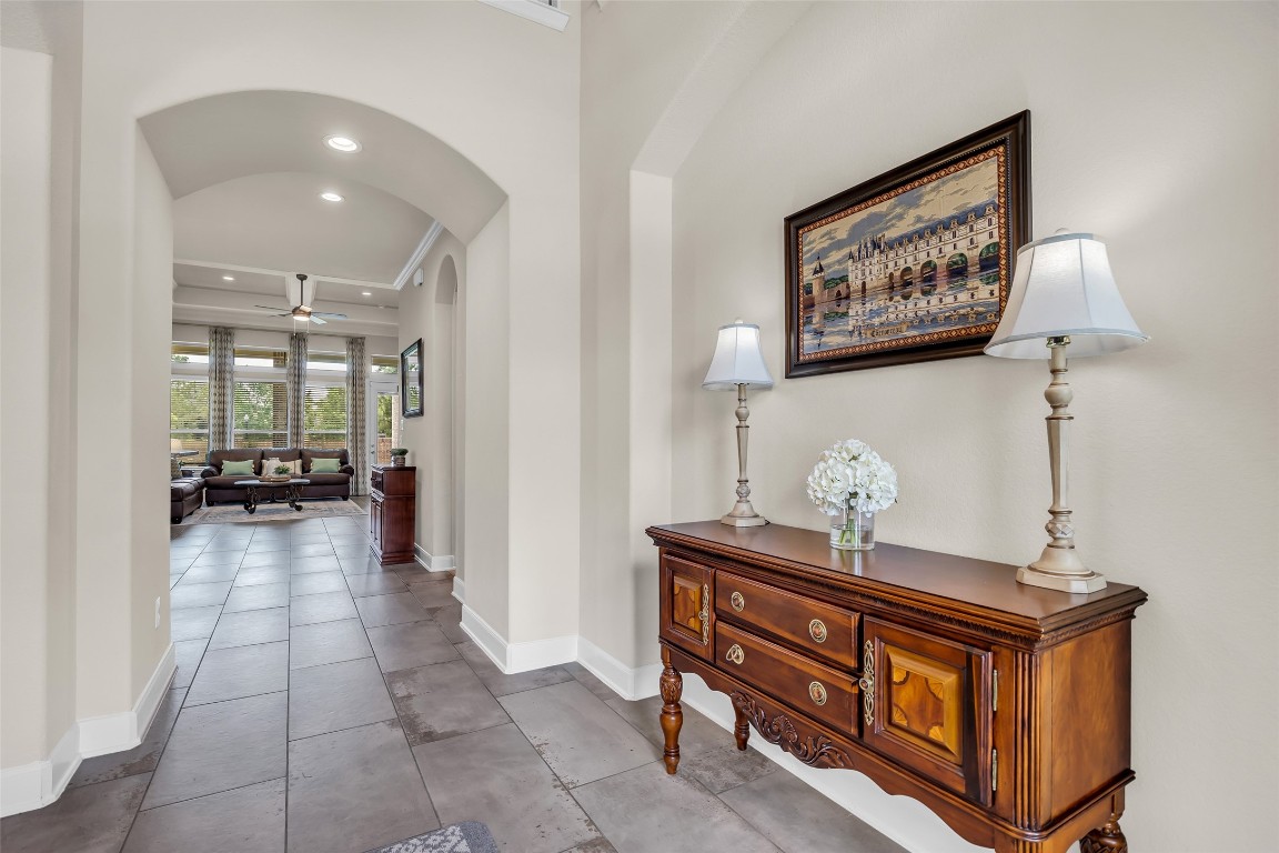 4060 Windsor Chase Drive Spring, TX 77386 - Photo 25 of 40 a view of a hallway to a livingroom with furniture and a couch