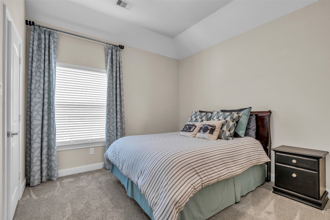 4060 Windsor Chase Drive Spring, TX 77386 - Photo 29 of 40 a bedroom with a bed and a tv