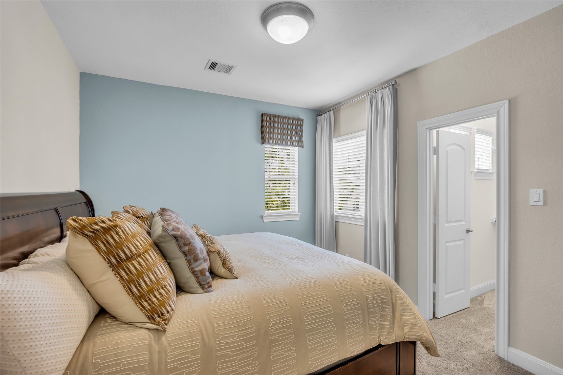 4060 Windsor Chase Drive Spring, TX 77386 - Photo 31 of 40 a bedroom with a bed and a window