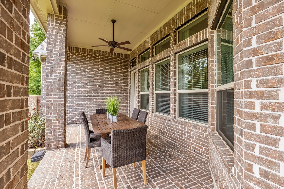 4060 Windsor Chase Drive Spring, TX 77386 - Photo 36 of 40 a view of a patio with a table and chairs