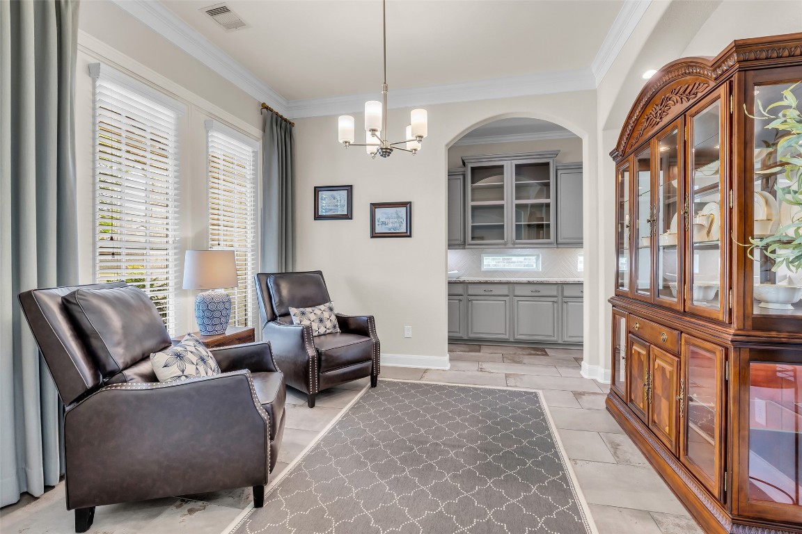 4060 Windsor Chase Drive Spring, TX 77386 - Photo 6 of 40 a living room with furniture two windows and a chandelier