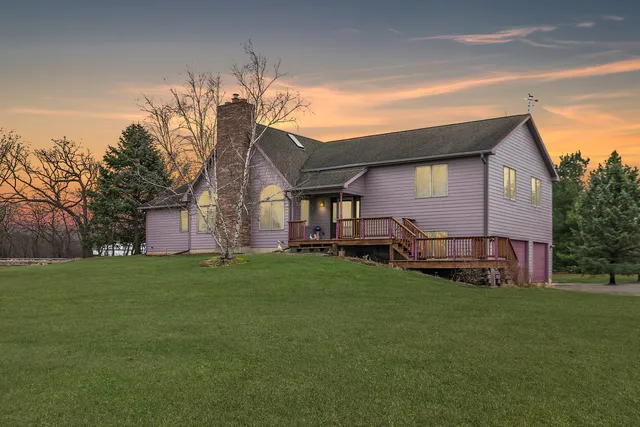 a house view with wooden fence