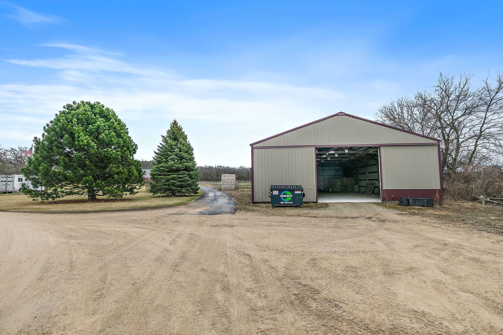 14N700 Factly Road Sycamore, IL 60178 - Photo 37 of 73 a front view of a house with a yard and garage